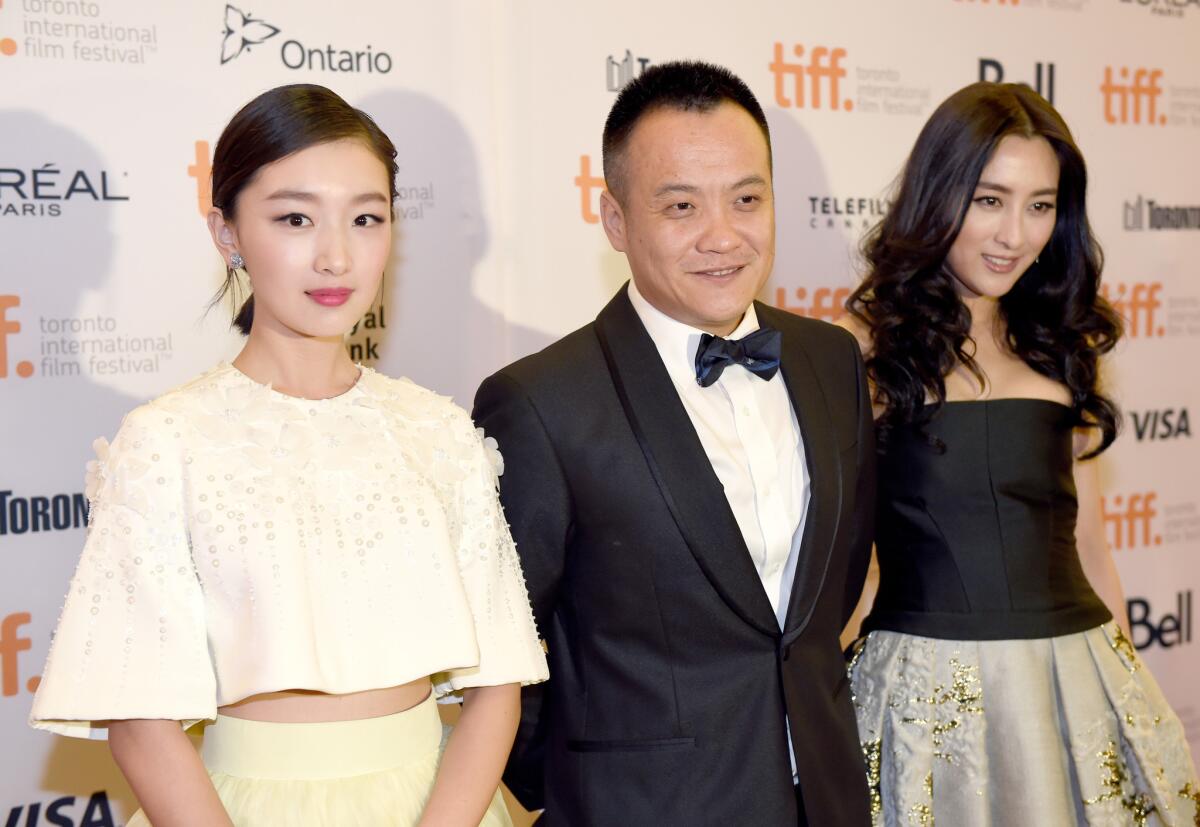 Actress Zhou Dongyu, director Ning Hao and actress Ma Su attend the "Breakup Buddies" premiere during the Toronto International Film Festival on Sept. 7.