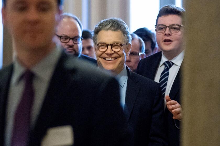 Sen. Al Franken, D-Minn., smiles as he leaves the Capitol after speaking on the Senate floor, Thursday, Dec. 7, 2017, on Capitol Hill in Washington. Franken said he will resign from the Senate in coming weeks following a wave of sexual misconduct allegations and a collapse of support from his Democratic colleagues, a swift political fall for a once-rising Democratic star. (AP Photo/Andrew Harnik)