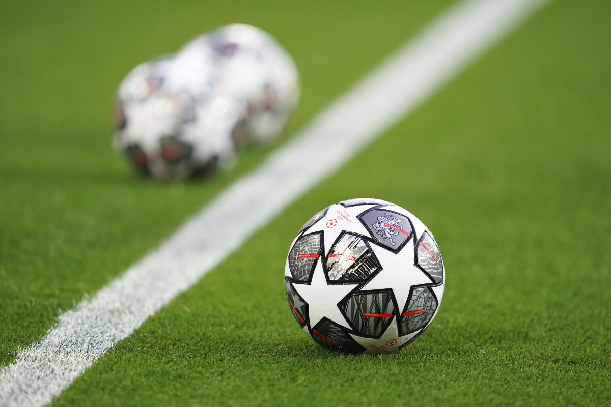 The Official UEFA Champions League match balls are on display ahead of the Champions League quarter final second leg soccer match between Liverpool and Real Madrid at Anfield stadium in Liverpool, England, Wednesday, April 14, 2021. (AP Photo/Jon Super)