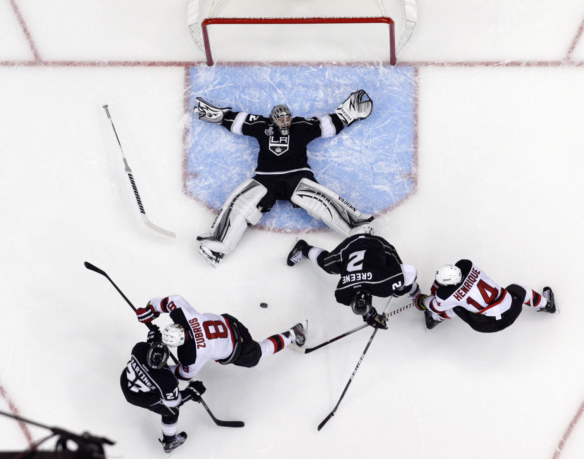 Kings goalie Jonathan Quick tries to keep the puck in front of him during Game 4 of the 2012 Stanley Cup Final.