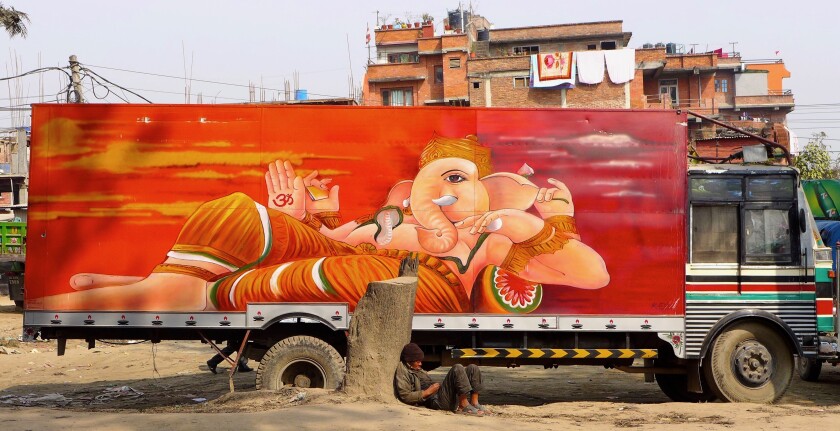 A freight truck painted with the Hindu god Ganesh