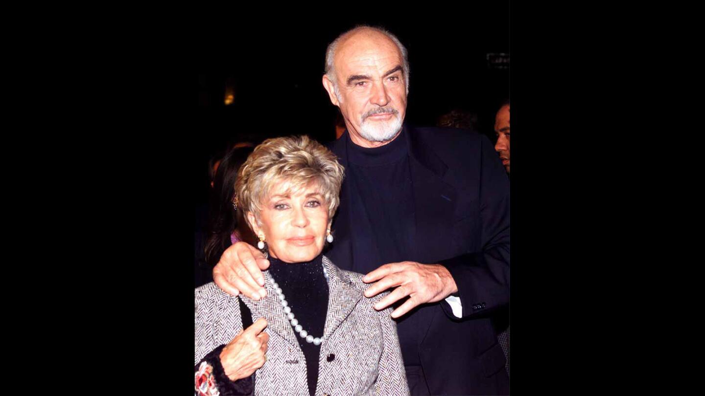 Connery poses with his wife, Micheline Roquebrune, at the premiere of "Finding Forrester," on Dec. 1, 2000.