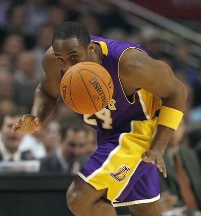 Kobe Bryant runs away with a steal during the first quarter.
