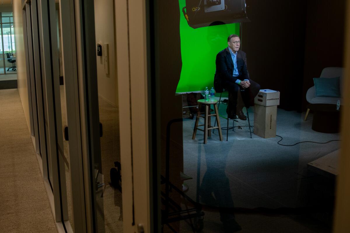 Executive Editor Norman Pearlstine speaks to Times staff members from the paper's El Segundo headquarters on Wednesday.