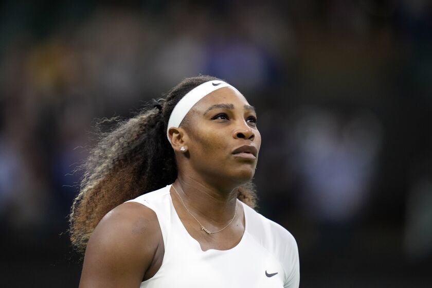 FILE - Serena Williams of the US plays Aliaksandra Sasnovich of Belarus for the women's singles first round match on day two of the Wimbledon Tennis Championships in London, Tuesday June 29, 2021. Williams added herself to the list of big-name withdrawals from the U.S. Open on Wednesday, Aug. 25, 2021 pulling out of the year’s last Grand Slam tournament because of a torn hamstring. (AP Photo/Kirsty Wigglesworth, file)