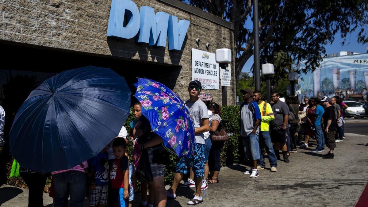 A line stretches around a DMV in South L.A. in August.