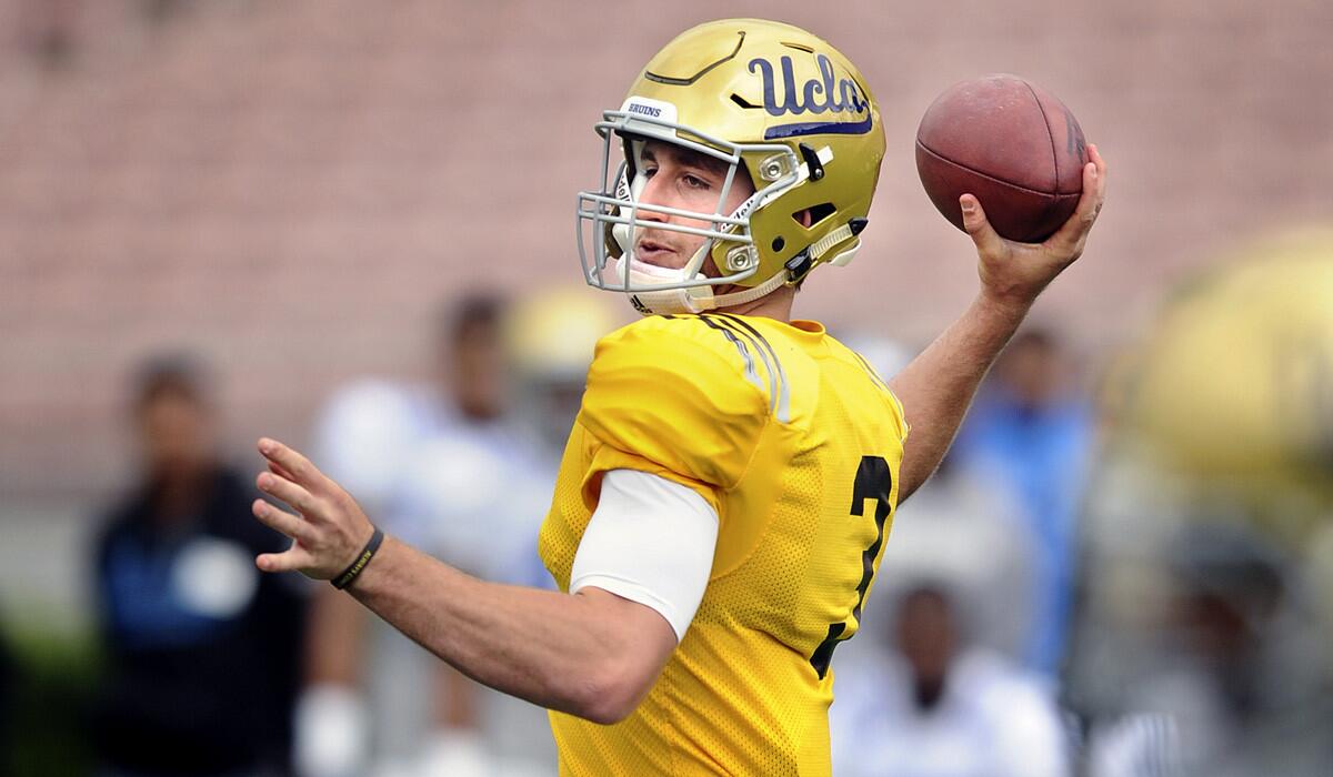 UCLA quarterback Josh Rosen throws a pass during the Bruins spring football game at the Rose Bowl on Saturday.