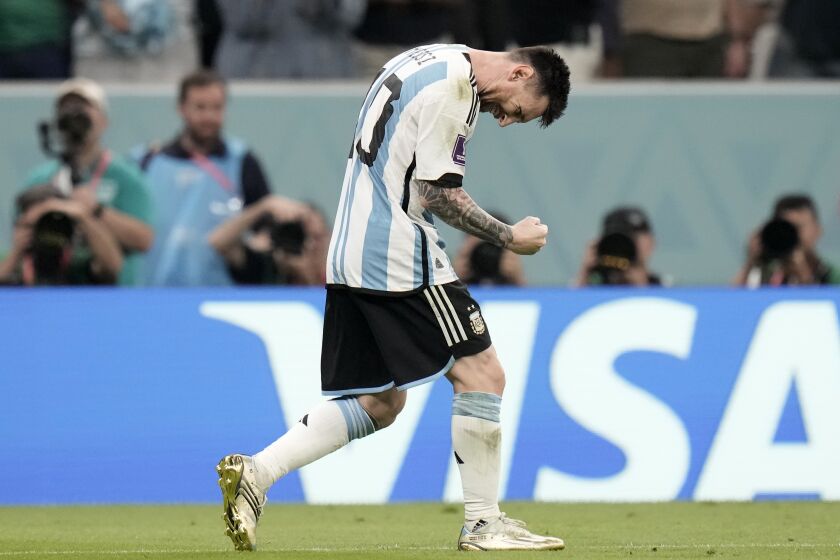 Argentina's Lionel Messi celebrates after scoring the opening goal during the World Cup group C soccer match between Argentina and Mexico, at the Lusail Stadium in Lusail, Qatar, Saturday, Nov. 26, 2022. (AP Photo/Moises Castillo)