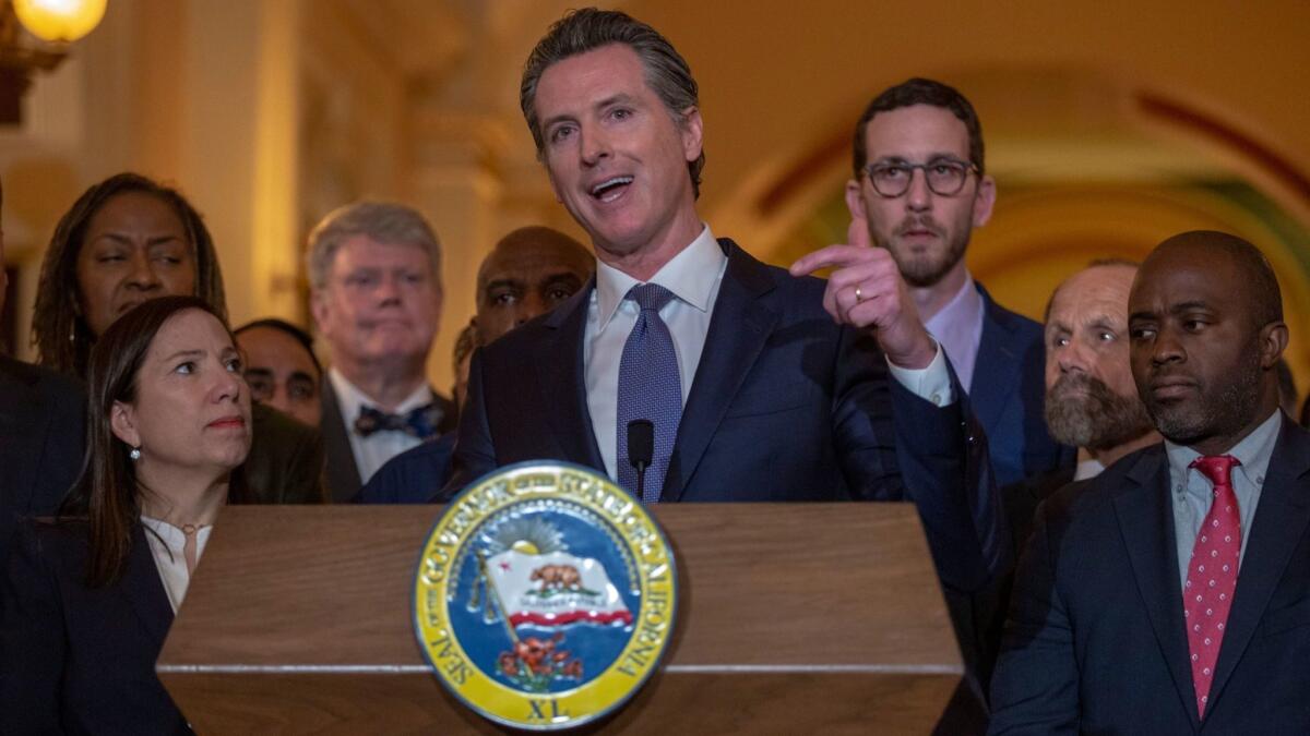 California Gov. Gavin Newsom announces he signed a moratorium on California's death penalty Wednesday during a news conference at the state Capitol in Sacramento.