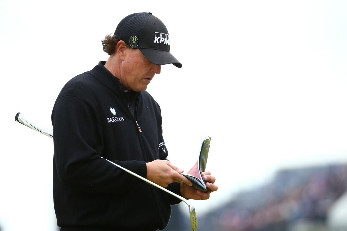 Phil Mickelson's attempt at a trick shot over a hotel sign ended up landing on a hotel balcony instead on Monday.