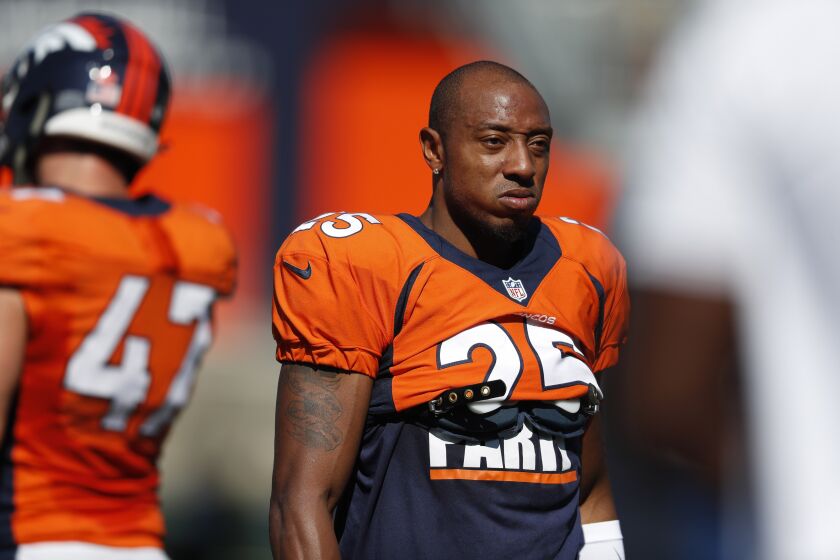 FILE - In this Aug. 5, 2019, file photo, Denver Broncos cornerback Chris Harris (25) takes part in drills during an NFL football training camp session in Englewood, Colo. Veteran cornerback Harris is about to test unfettered free agency for the first time in his nearly decade-long career. (AP Photo/David Zalubowski, File)