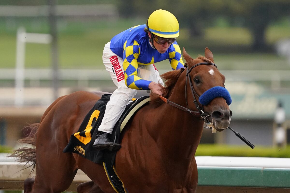 Jockey Drayden Van Dyke rides Charlatan at Santa Anita in March.