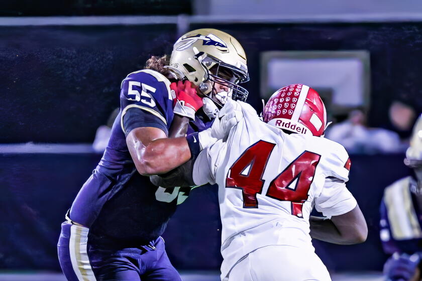 St. John Bosco offensive tackle Elisha Mueller (left) will need a strong performance against No. 1 Santa Margarita on Friday.