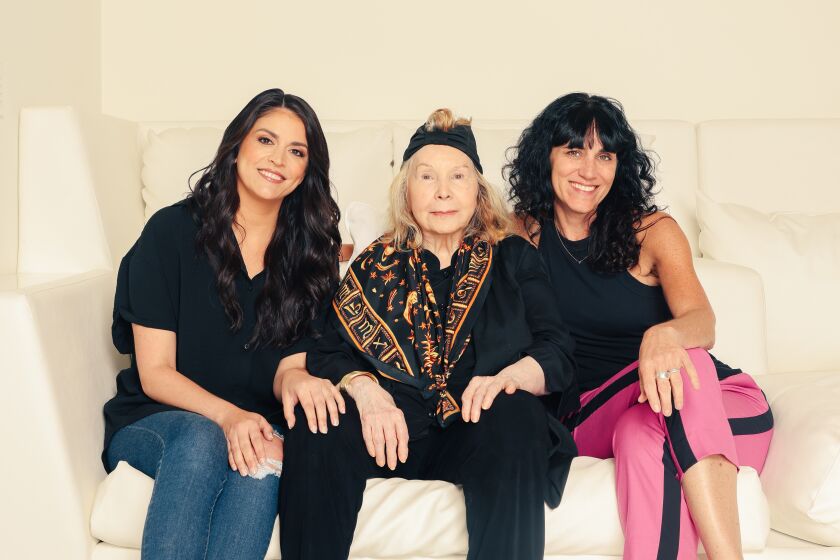 Los Angeles, CA - September 30: Cecily Strong, Jane Wagner and Leigh Silverman, left to right, pose for a portrait at a home on Friday, Sept. 30, 2022 in Los Angeles, CA. Cecily Strong acts in "The Search for Signs of Intelligent Life in the Universe," written by Jane Wagner for Lily Tomlin and directed by Leigh Silverman. (Dania Maxwell / Los Angeles Times)