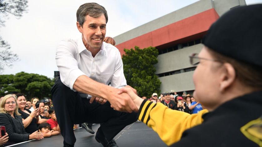Presidential candidate Beto O'Rouke greets a supporter after a rally at Los Angeles Trade-Technical College Saturday.