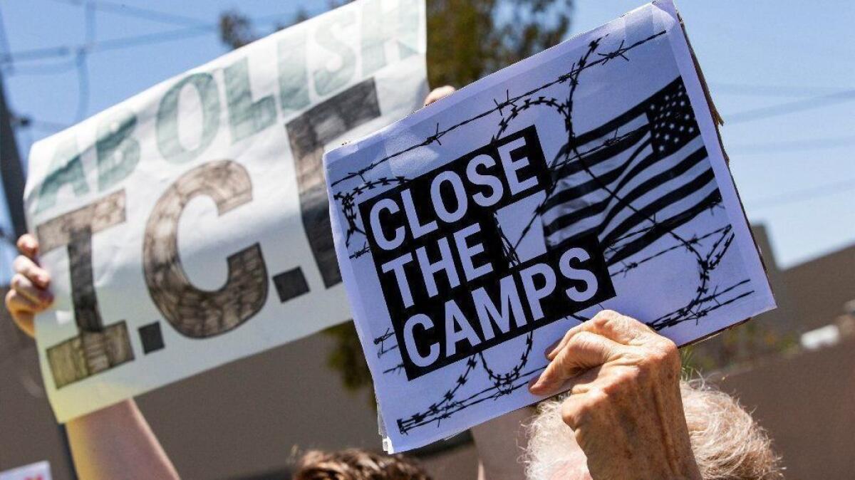 Demonstrators at the entrance of the Otay Mesa Detention Center during a protest against migrant detention in San Diego on July 2.
