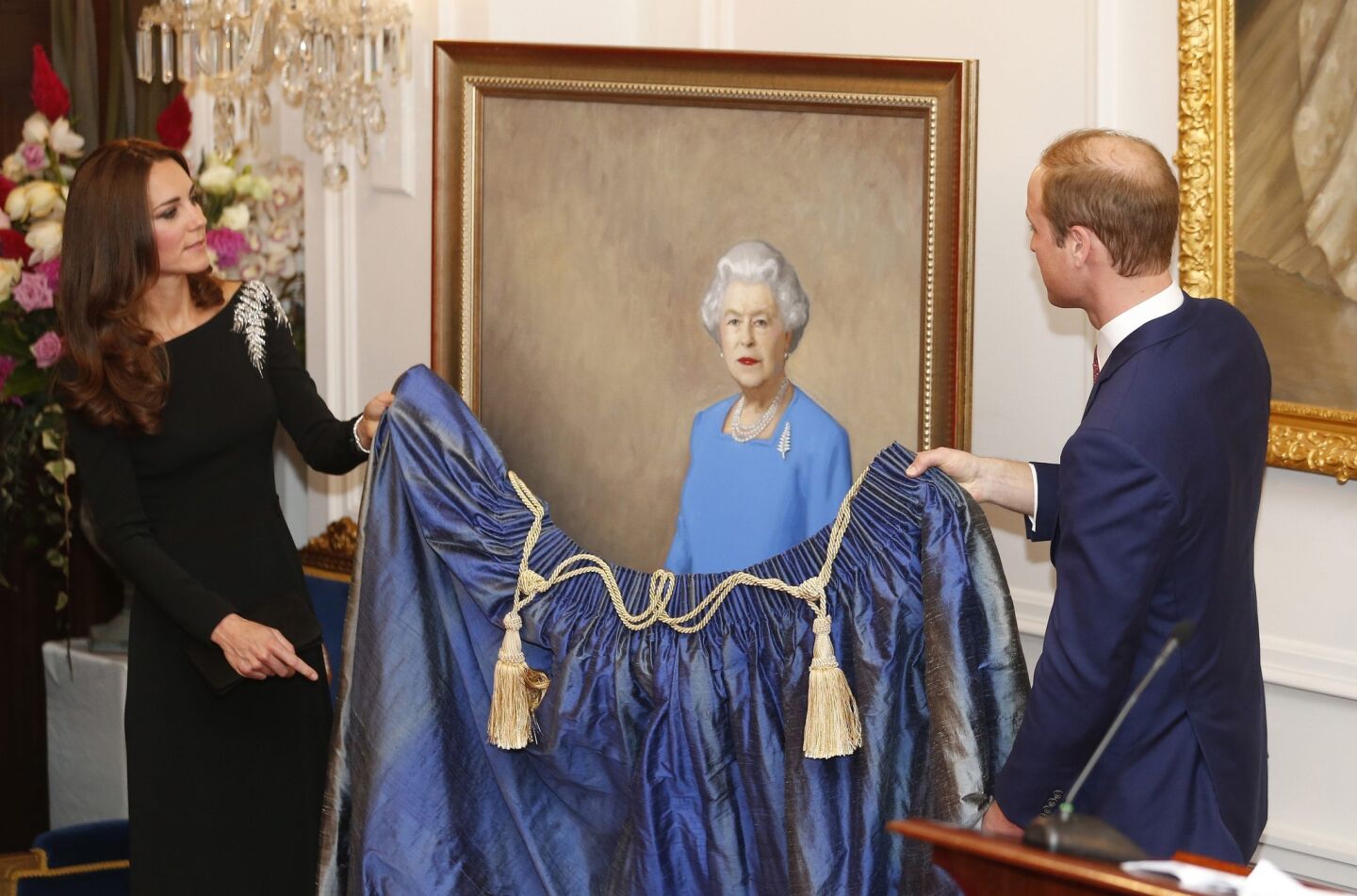 A portrait of Queen Elizabeth II by New Zealand artist Nick Cuthell is unveiled by Prince William and Catherine at Government House in Wellington.