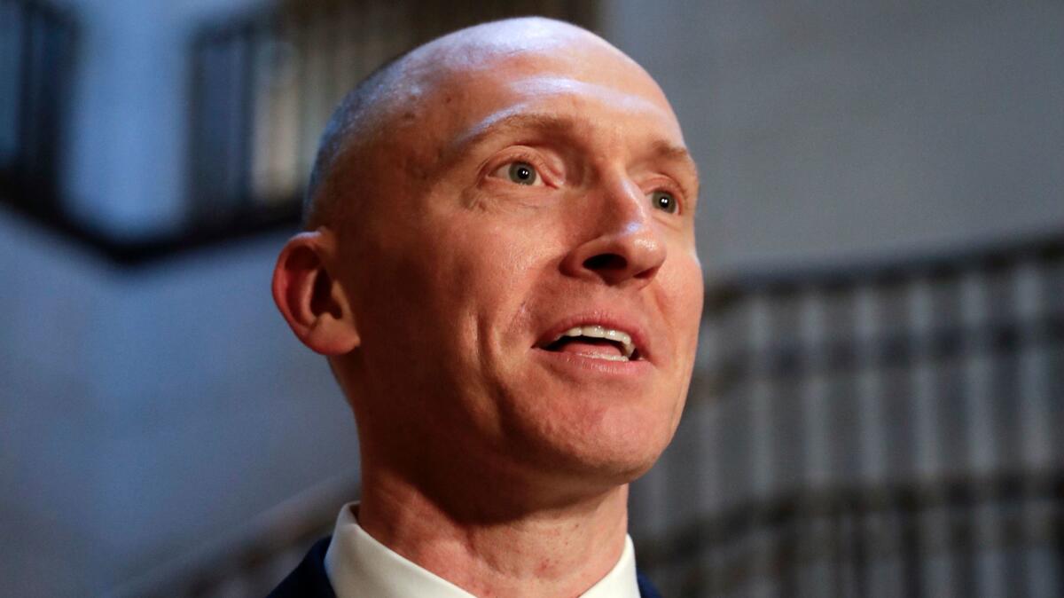 Carter Page, a foreign policy advisor to Donald Trump's 2016 presidential campaign, speaks with a reporter on Capitol Hill on Nov. 2, 2017.