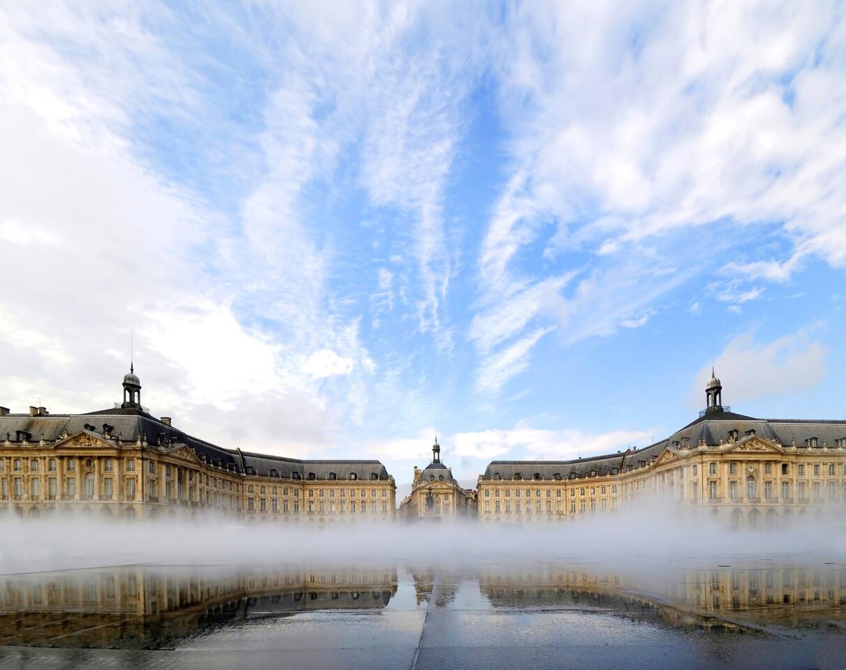 The Place de la Bourse in Bordeaux, France, was built in the 18th century for King Louis XV. Michel Corajoud's "water mirror" was added in recent years.