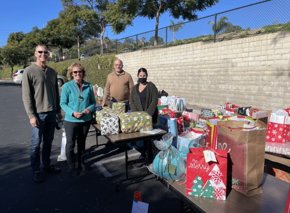 Distributing gifts to local families