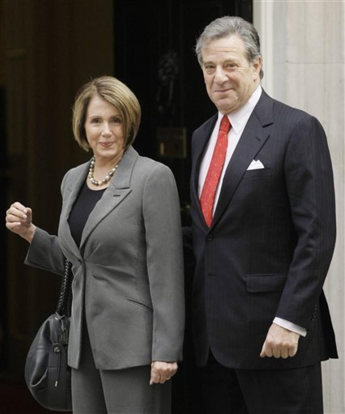 Speaker of the U.S. House of Representatives Nancy Pelosi and her husband Paul arrive at 10 Downing Street in London, to meet Britain's Prime Minister Gordon Brown, Tuesday May 12, 2009. (AP Photo/Matt Dunham)