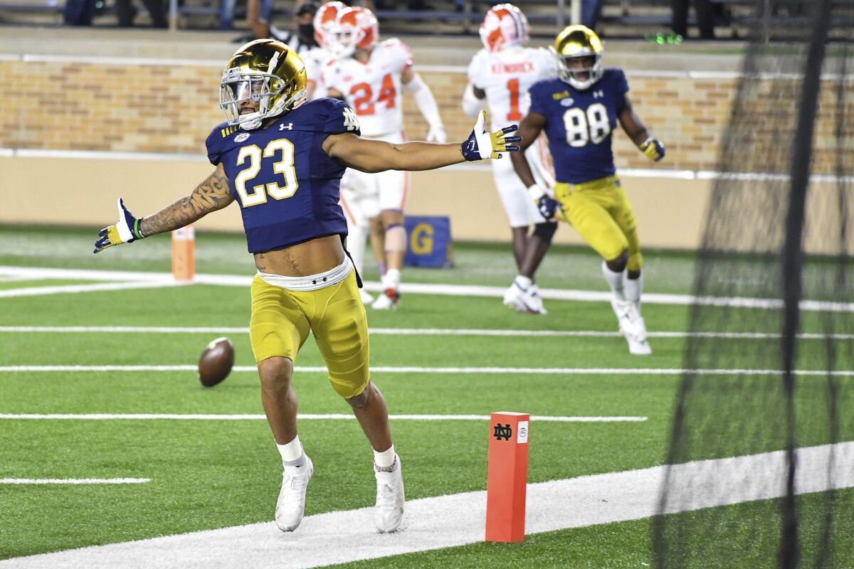 Notre Dame running back Kyren Williams (23) celebrates his first-quarter touchdown against Clemson on Nov. 7, 2020.
