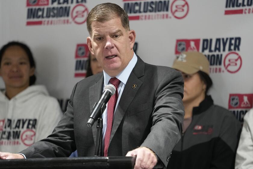 NHLPA executive director Marty Walsh delivers remarks during a news conference.