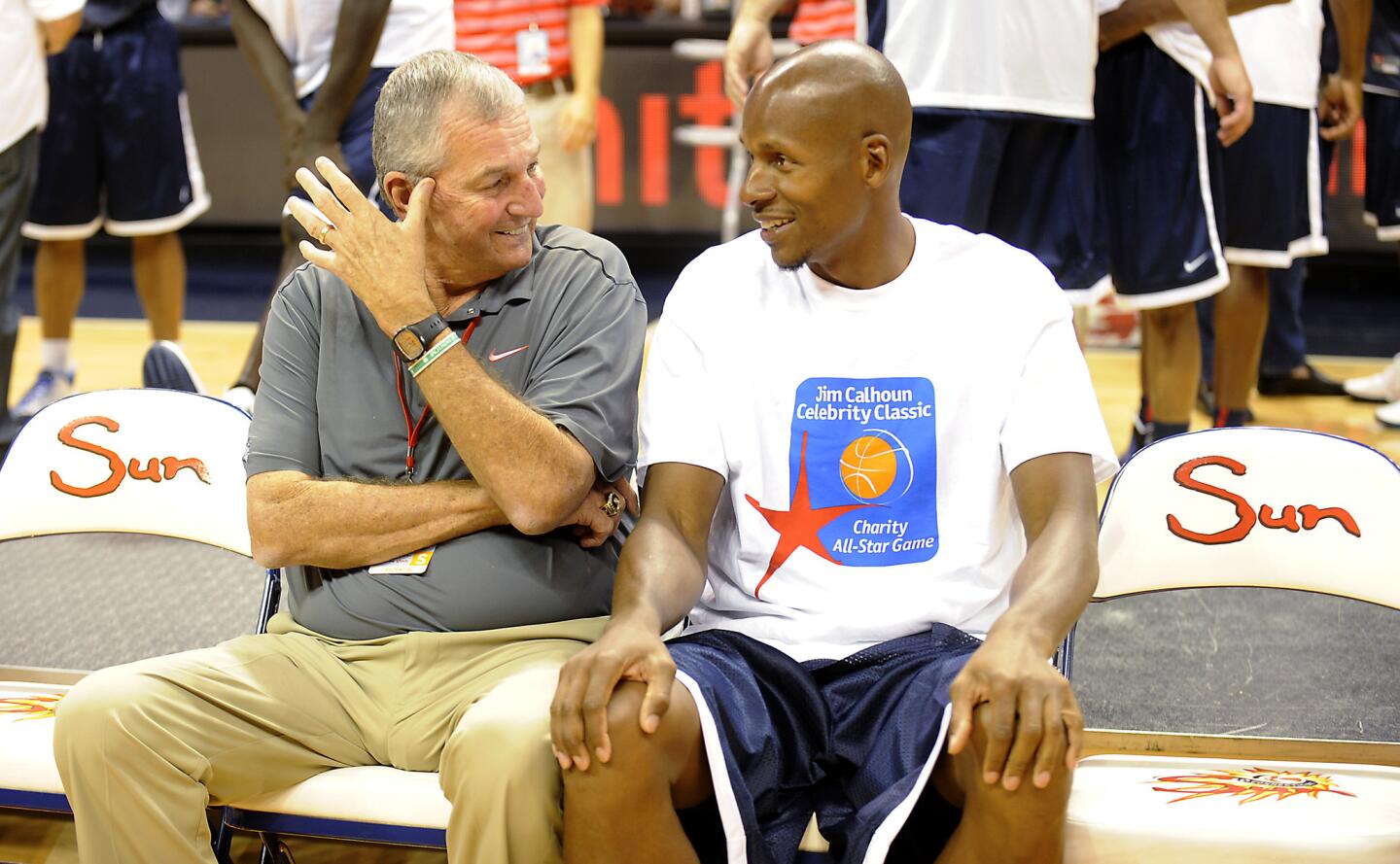 Jim Calhoun and Ray Allen spend a few moments together after a group photo before Calhoun's Celebrity Classic basketball game at the Mohegan Sun Arena Friday night in Uncasville.