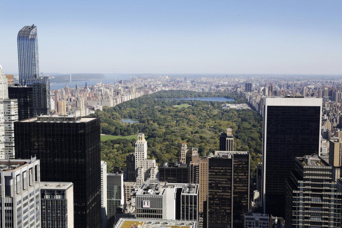 Central Park in New York, seen from midtown Manhattan, is bordered by dense city on all sides.