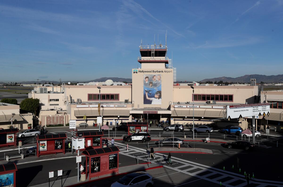 An employee who handles luggage at Hollywood Burbank Airport has tested positive for the coronavirus, according to a statement released on Monday by the company that employs the worker.