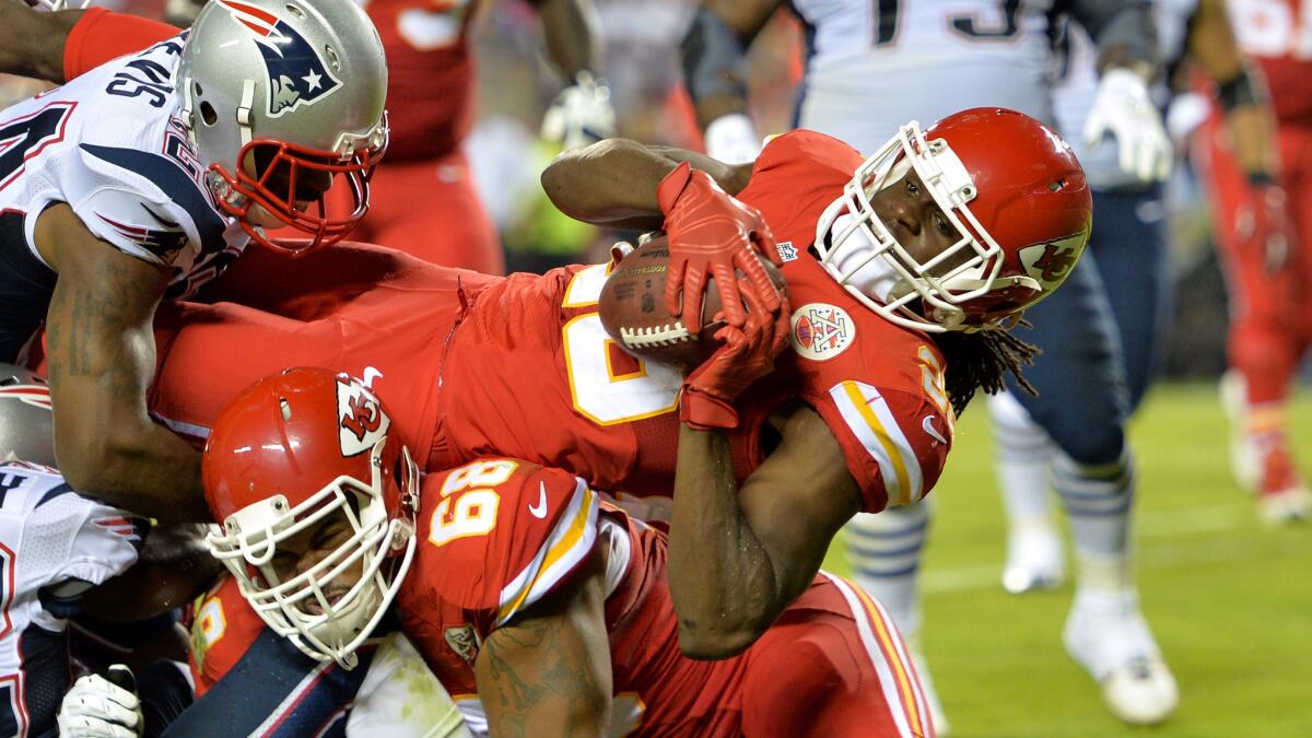 Kansas City Chiefs running back Jamaal Charles scores a second-quarter touchdown during Monday's game against the New England Patriots.