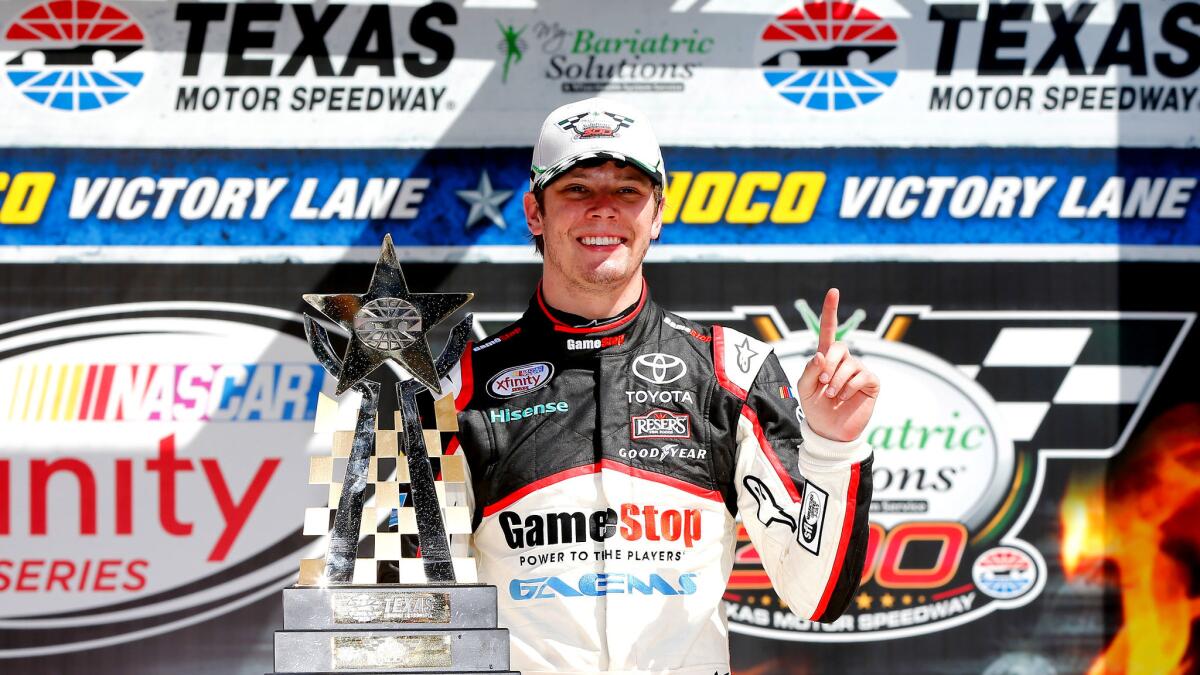 NASCAR driver Erik Jones celebrates in Victory Lane after winning the Xfinity Series My Bariatric Solutions 300 at Texas Motor Speedway on Saturday.