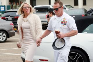 SAN DIEGO, CA - JUNE 24: Navy Special Operations Chief Edward Gallagher walks into military court with his wife Andrea Gallagher June 24, 2019 in San Diego, California. Chief Gallagher is on trial for war crimes for shooting of unarmed civilians in Iraq in 2017, including a school-age girl, and with killing a captured teenage ISIS fighter with a knife, among other crimes while deployed. (Photo by Sandy Huffaker/Getty Images) *** BESTPIX *** ** OUTS - ELSENT, FPG, CM - OUTS * NM, PH, VA if sourced by CT, LA or MoD **