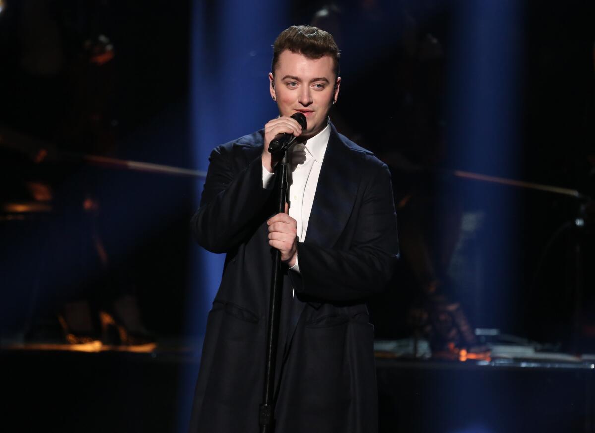 Sam Smith, shown at the 42nd American Music Awards in November, alluded to his breakup during a Toronto concert Tuesday.