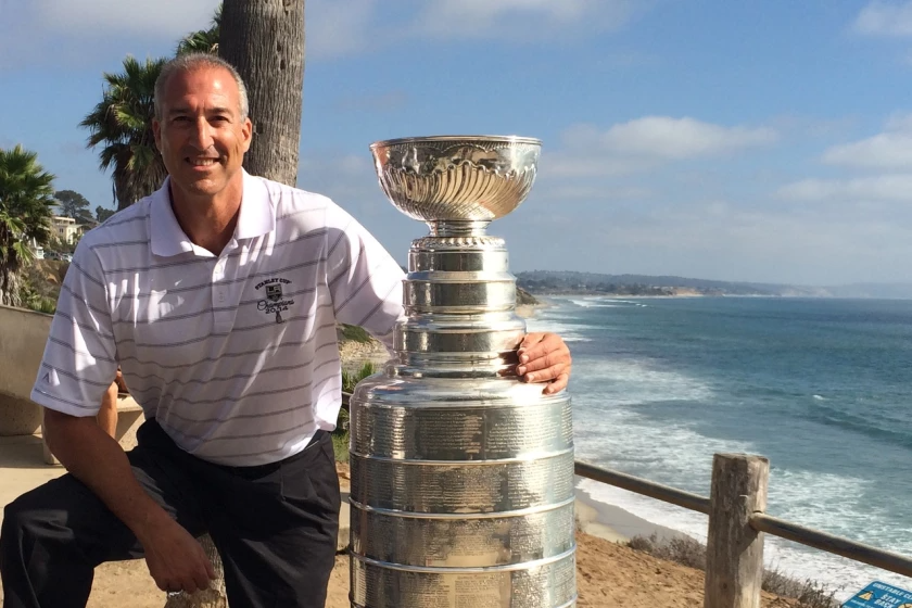 Jeff Solomon poses with the Stanley Cup