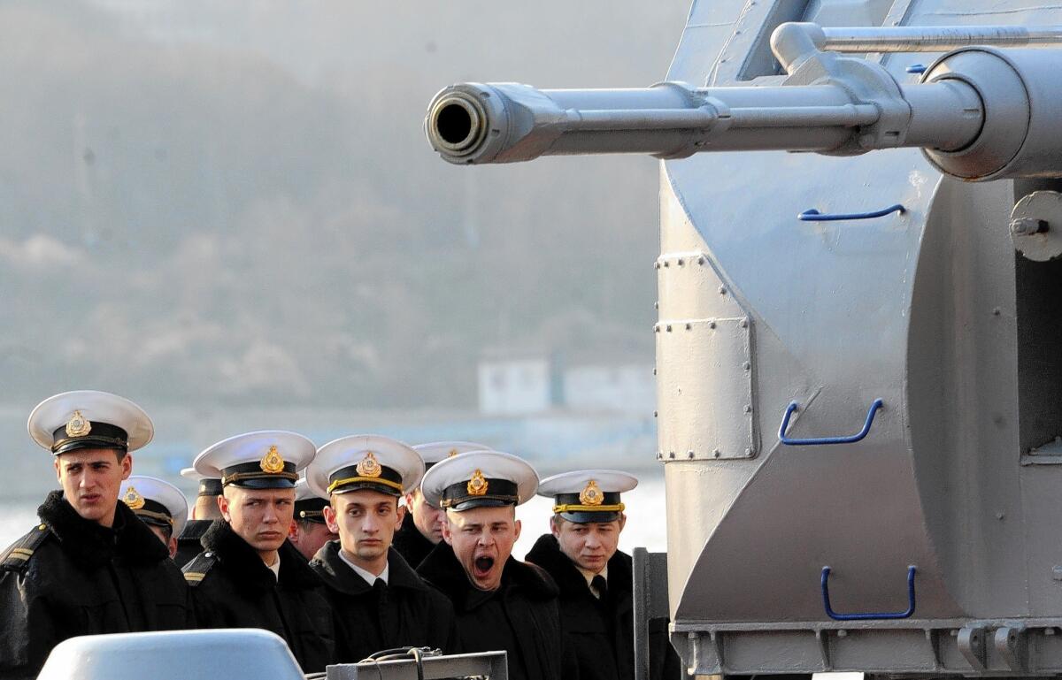 Ukrainian sailors parade on a ship off Sevastopol, Crimea. The Ukrainian military has avoided confrontations with Russian forces in Crimea.