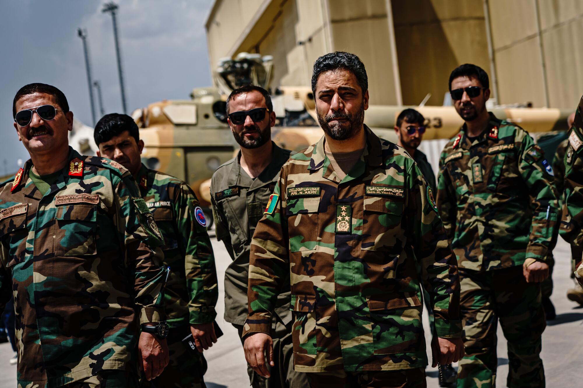 Afghan military officers walk together