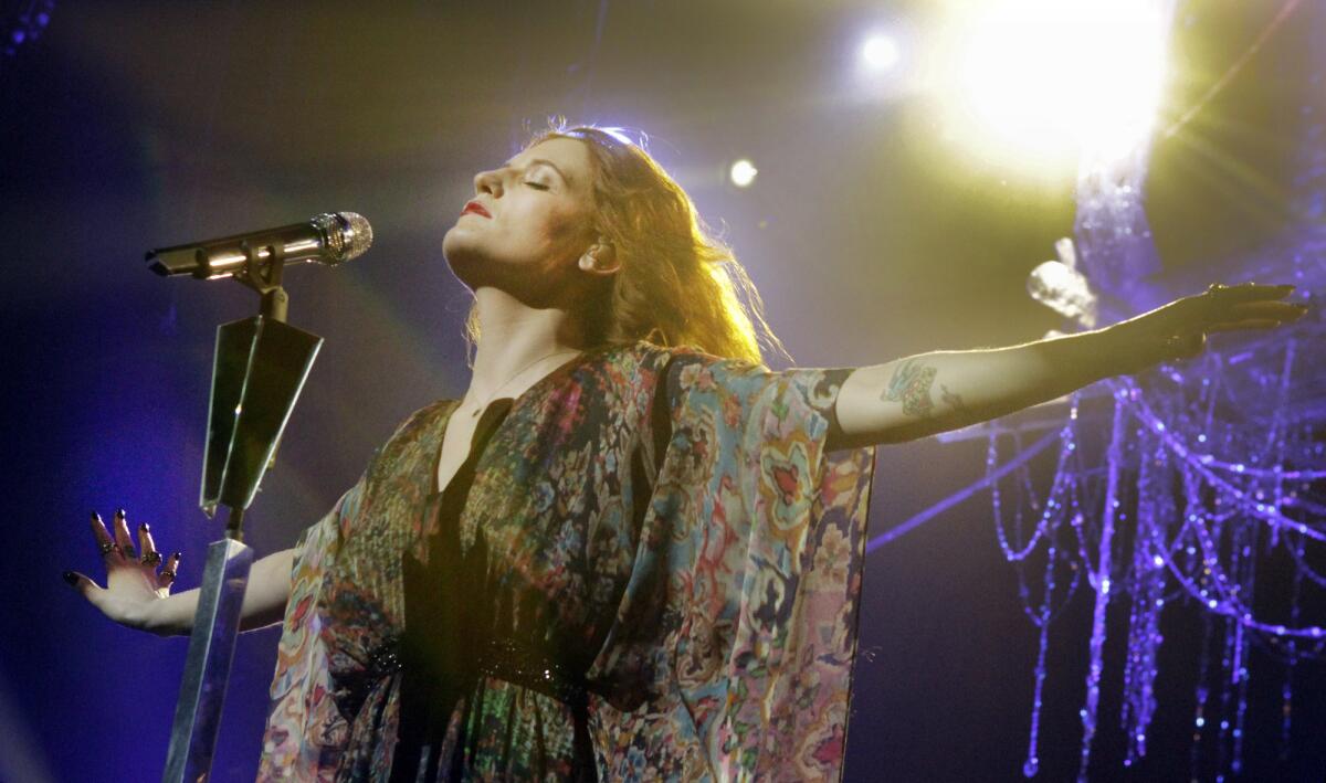 Florence Welch of Florence + the Machine performs during KROQ Almost Acoustic Christmas at the Gibson Amphitheatre in December 2011.