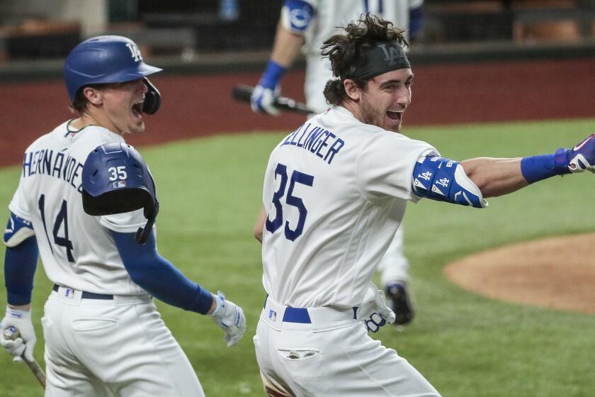 Arlington, Texas, Sunday, October 18, 2020. Los Angeles Dodgers center fielder Cody Bellinger (35) homers in the seventh inning in game seven of the NLCS at Globe Life Field. (Robert Gauthier/ Los Angeles Times)