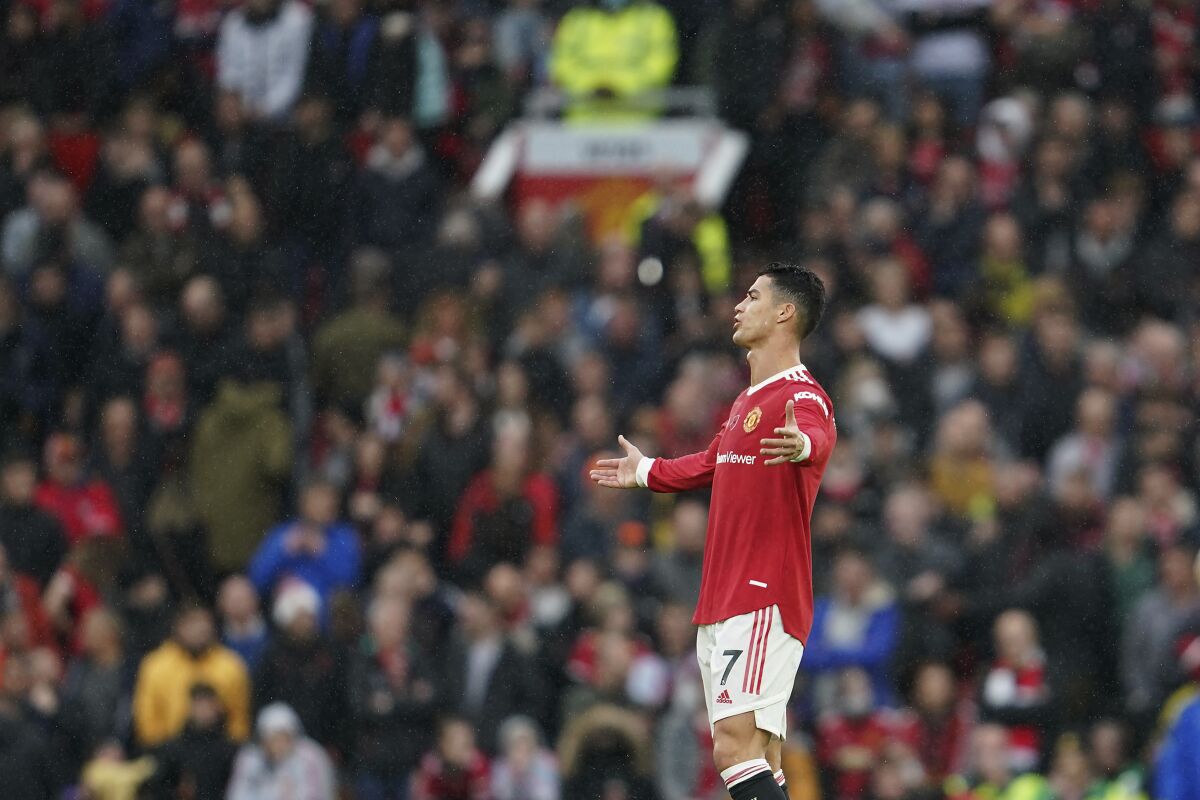 Manchester United's Cristiano Ronaldo reacts after Manchester City's Bernardo Silva scored his side's second goal during the English Premier League soccer match between Manchester United and Manchester City at Old Trafford stadium in Manchester, England, Saturday, Nov. 6, 2021. (AP Photo/Jon Super)