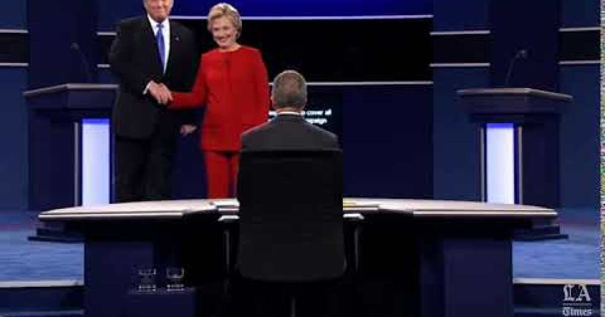 Hillary Clinton and Donald Trump shake hands to begin the first ...