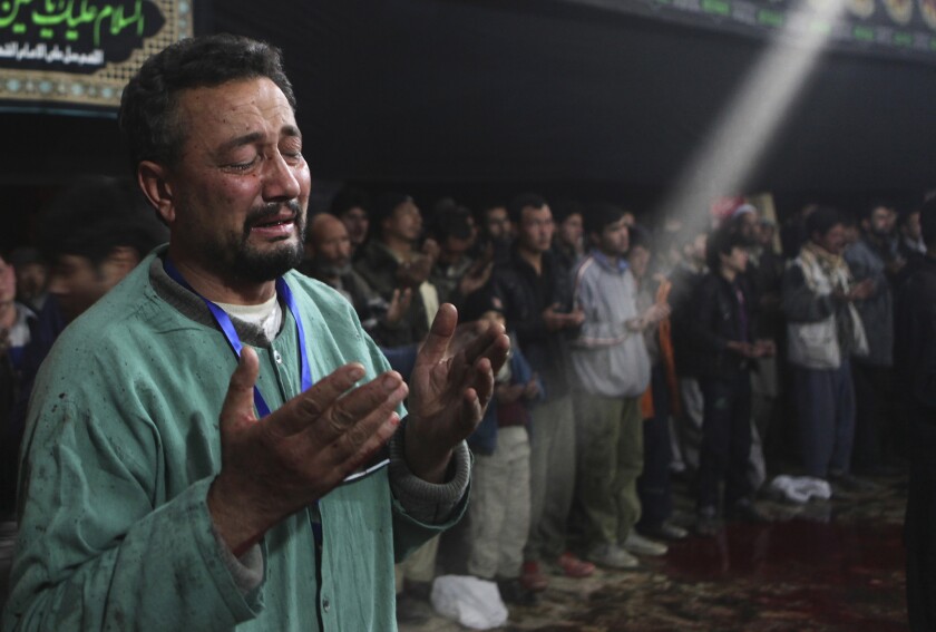 A man prays in a mosque in Kabul, Afghanistan.