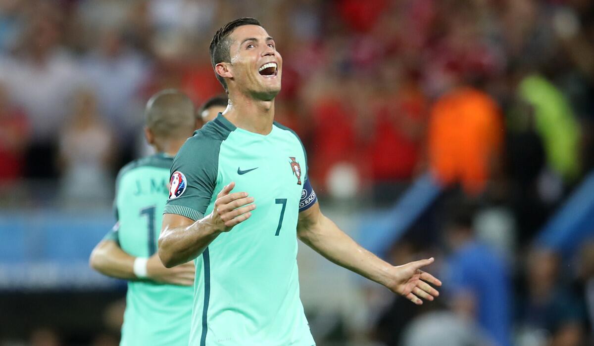 Portugal's Cristiano Ronaldo celebrates winning the Euro 2016 semifinal soccer match against Wales on Wednesday.