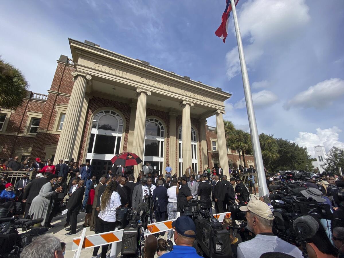 Hundreds of pastors rally outside a Georgia courthouse.