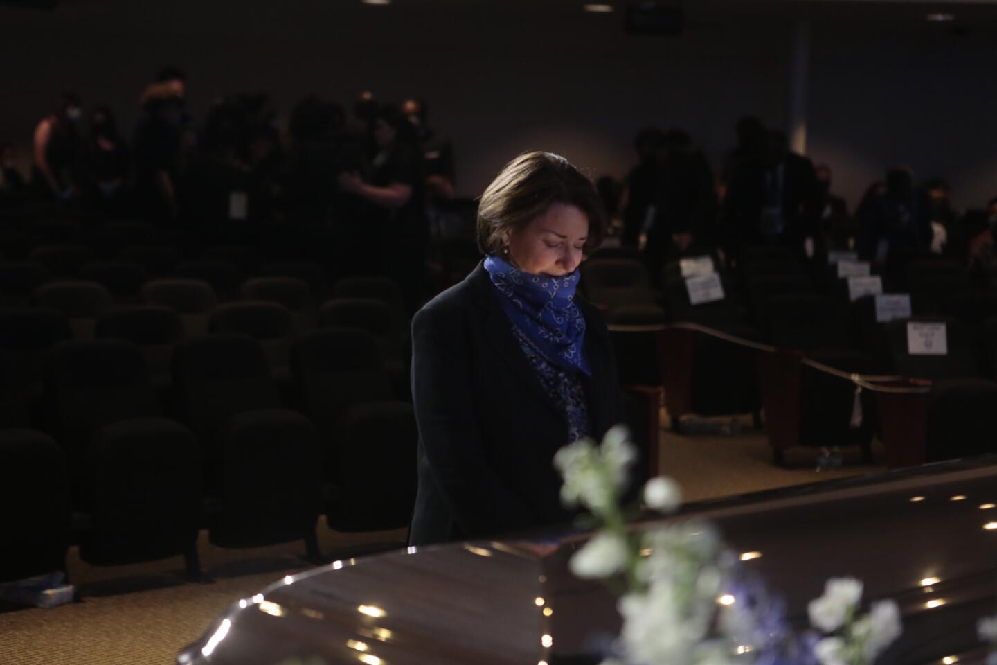 Sen. Amy Klobuchar pauses before George Floyd's casket.