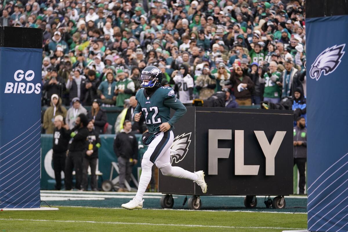 Eagles safety Marcus Epps runs onto the field before the NFC championship game.