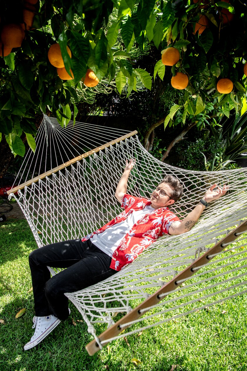 A man reclining in a hammock