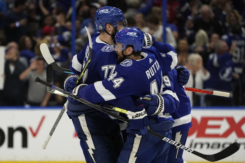 Tampa Bay Lightning defenseman Jan Rutta (44) celebrates with defenseman Victor Hedman (77) after Rutta scored against the New York Islanders during the third period in Game 2 of an NHL hockey Stanley Cup semifinal playoff series Tuesday, June 15, 2021, in Tampa, Fla. (AP Photo/Chris O'Meara)