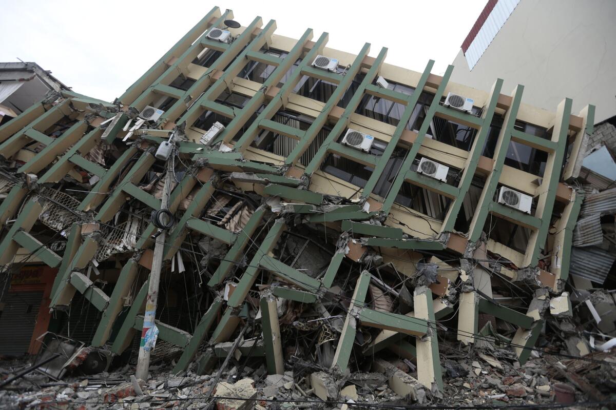 A building is toppled in Portoviejo, Ecuador, on Sunday after an earthquake the day before.