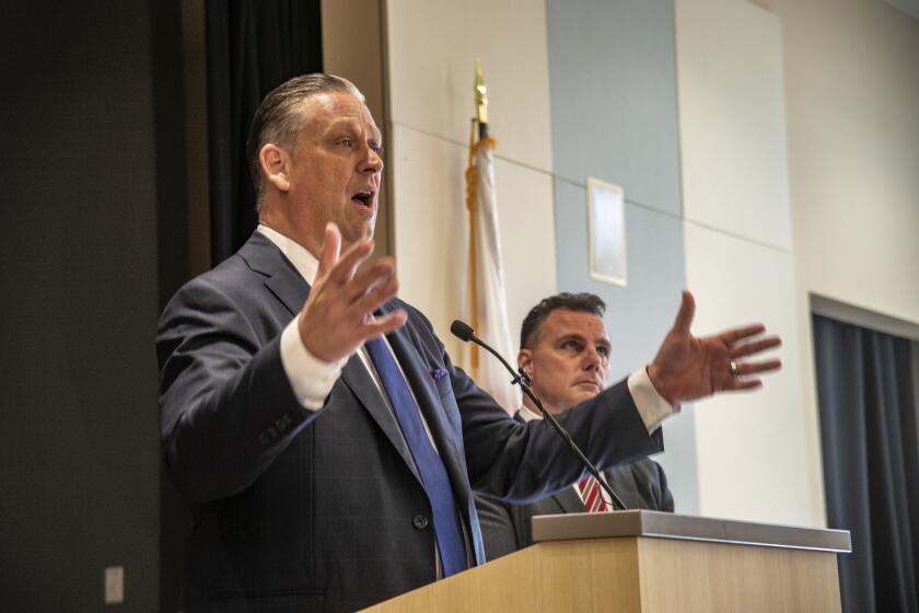 HB Mayor Tony Strickland opens the town hall meeting.